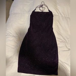 Sparkly purple mini dress with semi open back.